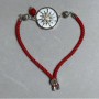 Textile bracelet, 5.5 mm diameter +/-, adjustable, with a silver-colored metal insert, 24 mm diameter +/-