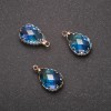 Pingente «Gota» azul com aro dourado 10x17mm