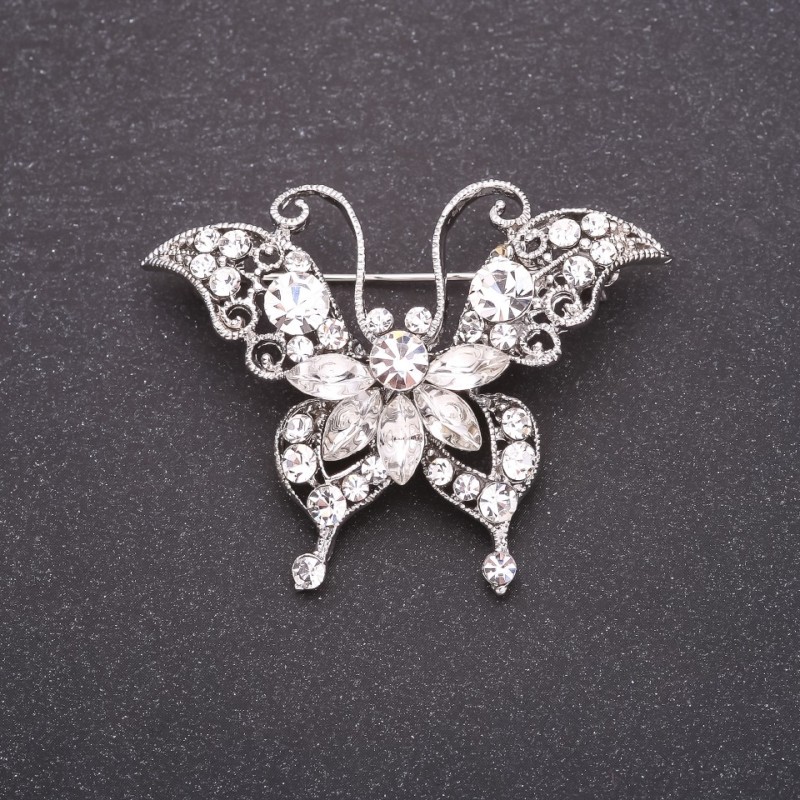 Broche Borboleta com strass brancos 40x50mm metal branco